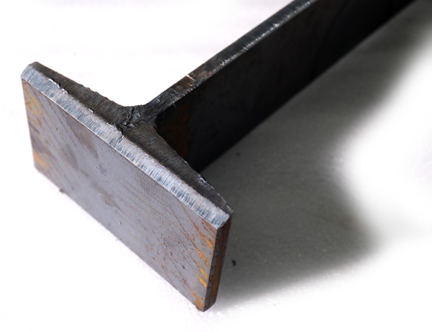 T-section cut from steel plate on the Koenig LF12012S heavy beam fiber laser